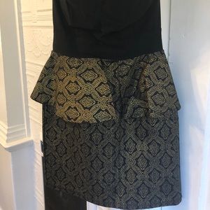 Peplum black and gold strapless dress